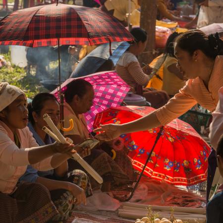 People at the village market. Muang Sing, Luang Nam Tha province, Laos. January 2015.