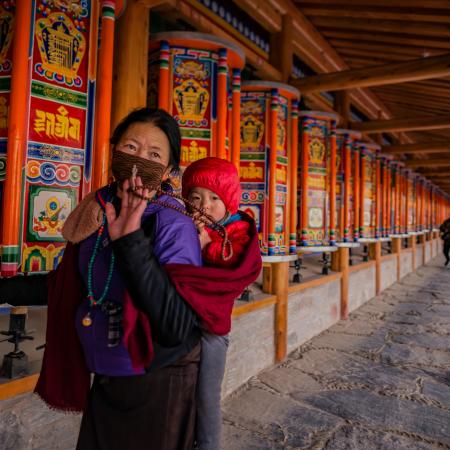 Pilgrim in Labrang Monastery. Gannan Tibetan Autonomous Prefecture. Gansu, China. December 2019.