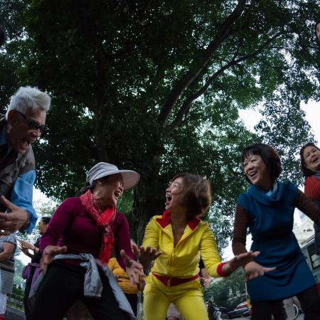 Laughter therapy in the morning. Hanoi, Vietnam. November 2017.